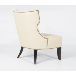 TUFTED BACK LOUNGE ARMCHAIR with wenghè wooden base and leather upholstery