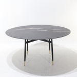 Mesa ESTER con tapa redonda de mármol de guinea negro de 107cm de diámetro y base de metal negro